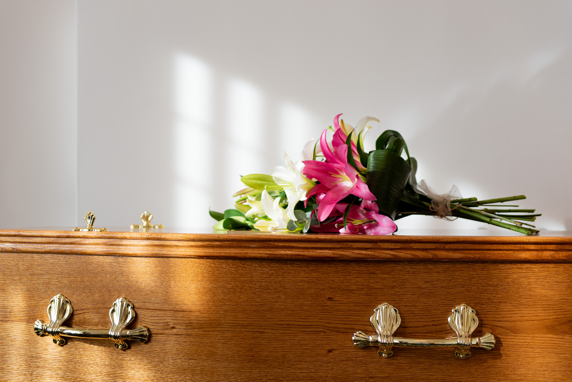 Funeral flowers and coffin